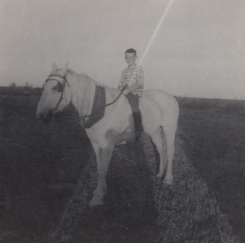 A picture of Charles as a teenager on the PEI farm